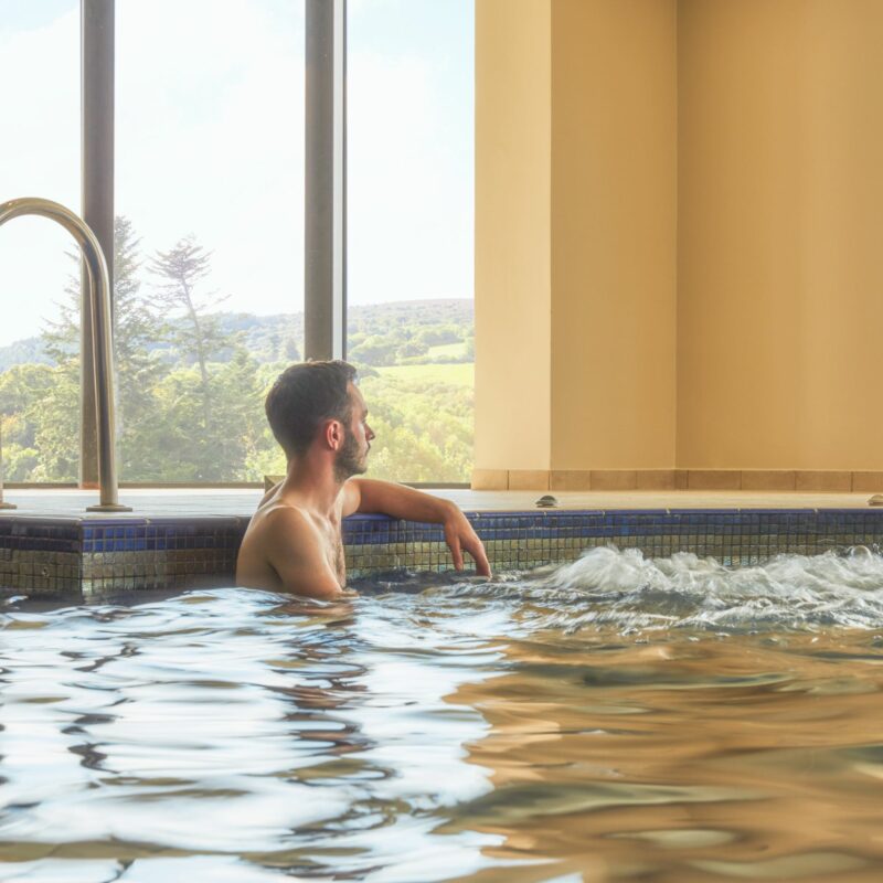Man relaxing in pool